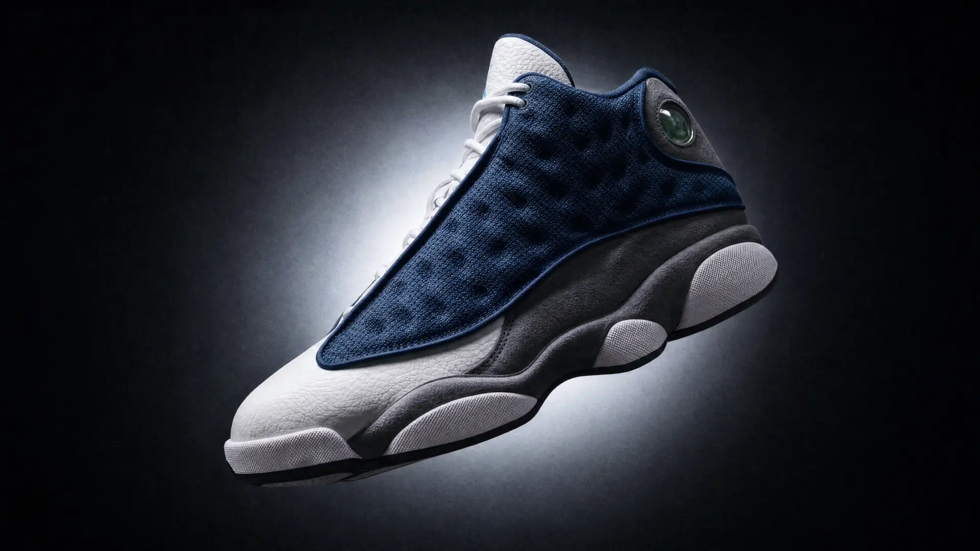 NIKE — SNEAKER PRODUCT STILL, SPOTLIT ON BLACK