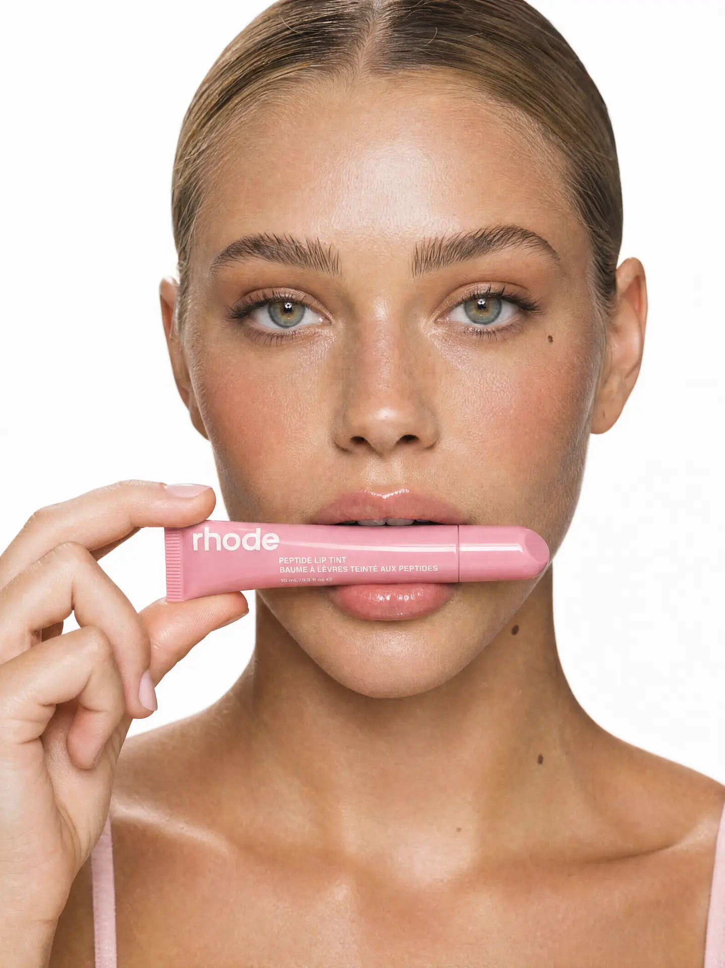RHODE — FRONT PORTRAIT PRESENTING THE PEPTIDE LIP TINT