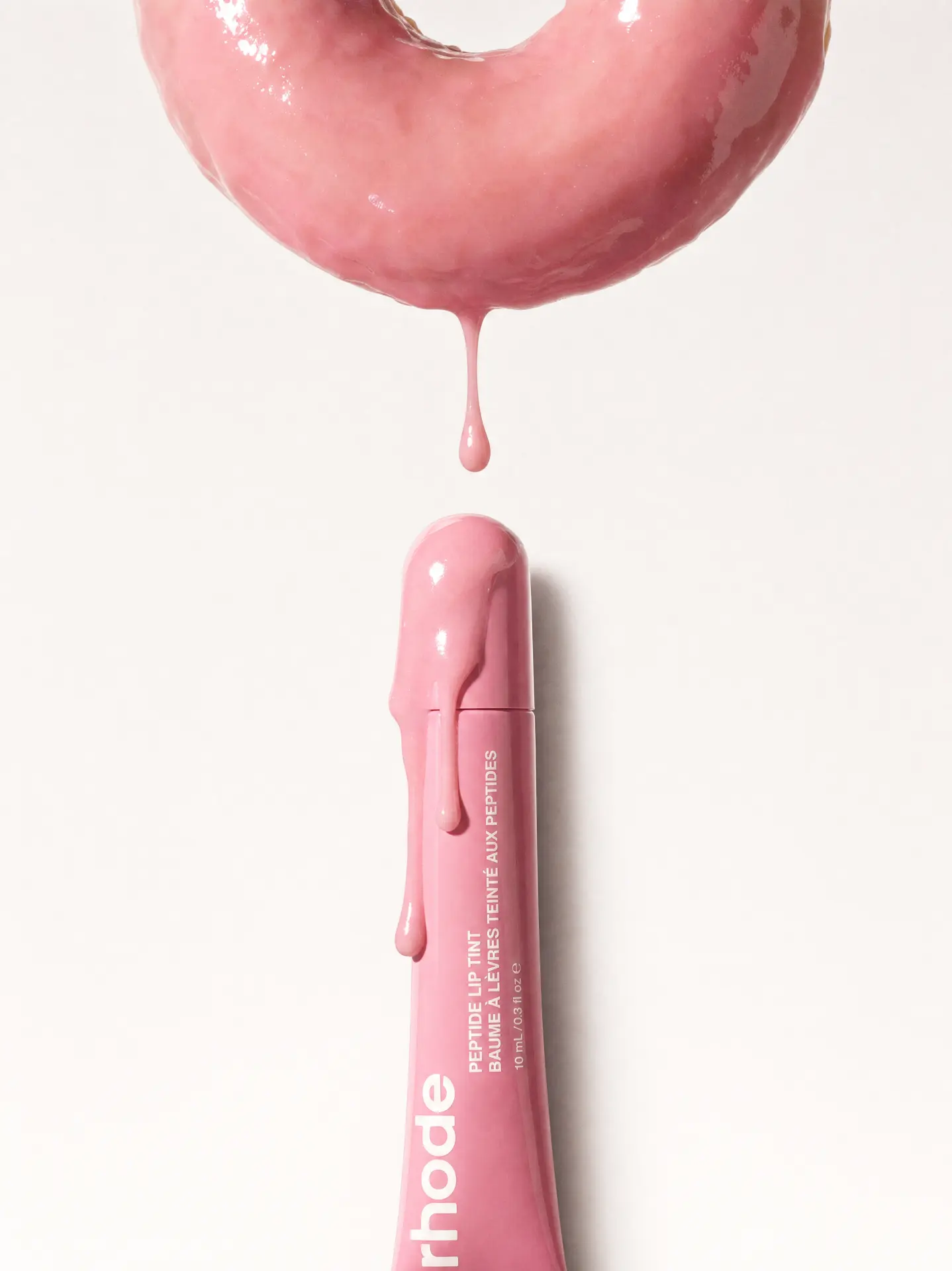 RHODE — GLAZED DONUT DRIPPING ONTO THE LIP TINT